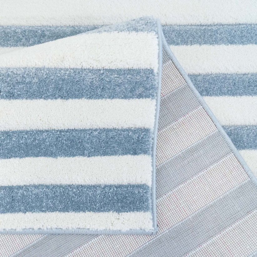 Dětský námořnický koberec bílo modré barvy
