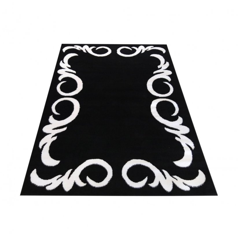 Черен килим с бял орнамент