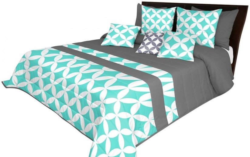 Moderní šedý přehoz na postel s prošíváním a tyrkysovým motivem