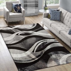 Оригинален килим с абстрактен десен в сив цвят