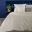 Cuvertură de pat albă-crem modernă, de o singură culoare, cu un motiv de frunze