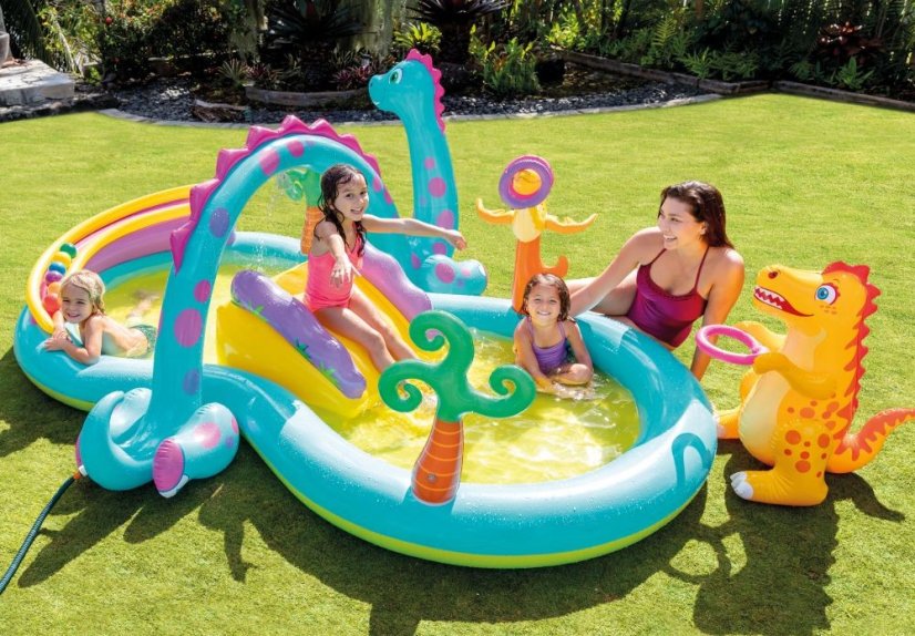Piscina a forma di parco giochi con dinosauro