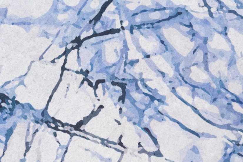 Semplice tappeto bianco e blu con motivo astratto