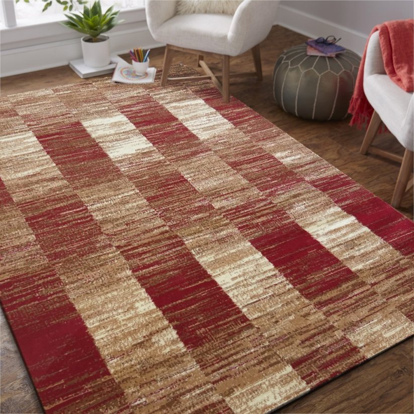 Červený kusový koberec do obýváku