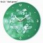 Zelené hodiny s ornamentom