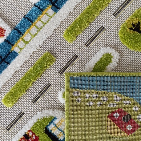 Szenzoros gyerekszőnyeg tengerparti város motívummal