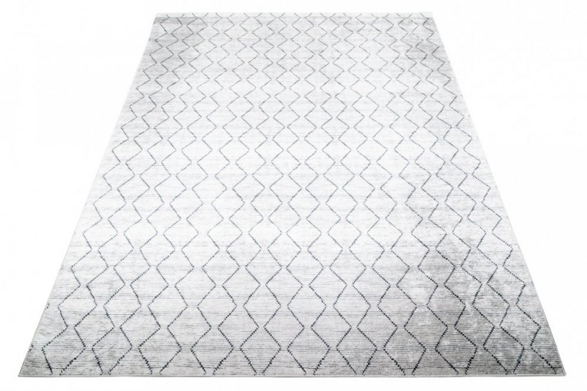 Světle šedý moderní koberec s jednoduchým vzorem