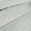 Velvet bedspread quilted in geometric pattern