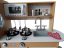 Cucina in legno per bambini con accessori e illuminazione a LED