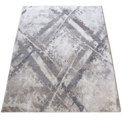 Béžový koberec s moderním abstraktním vzorem