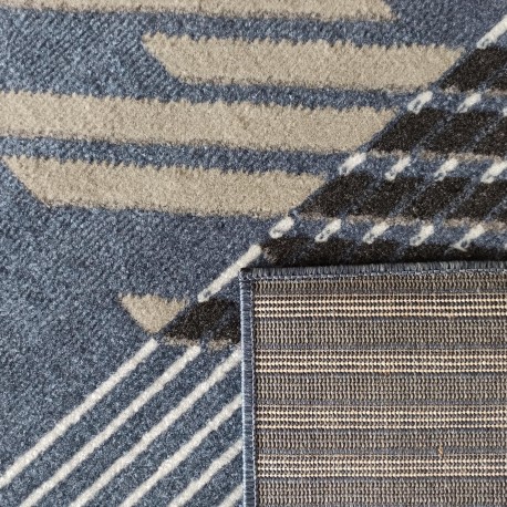 Designový koberec v modré barvě s pruhy