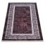 Elegante tappeto marrone con bordo ornamentale