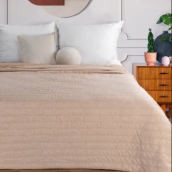 Meruňkový prošívaný přehoz na postel se lněnou texturou