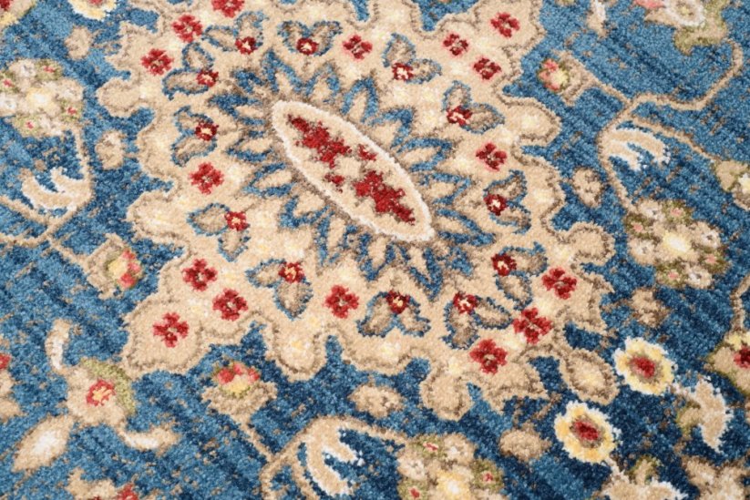 Кръгъл винтидж килим в синьо