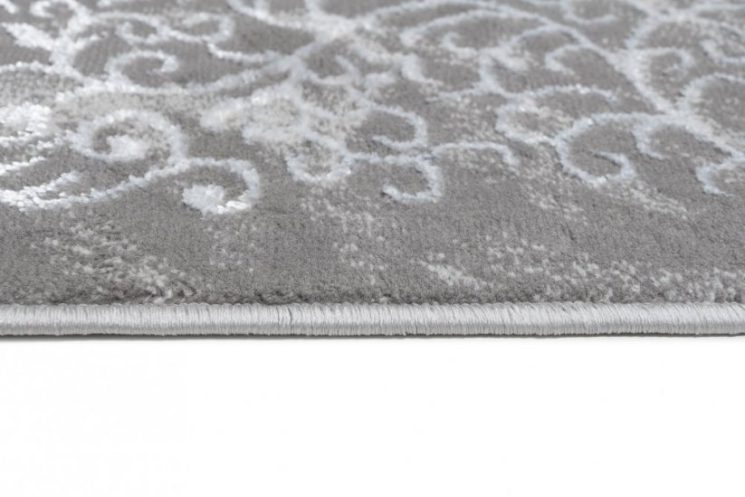 Moderní bílý a šedý designový interiérový koberec se vzorem