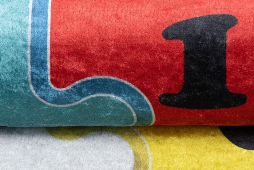 Kinderteppich mit buntem Puzzlemotiv