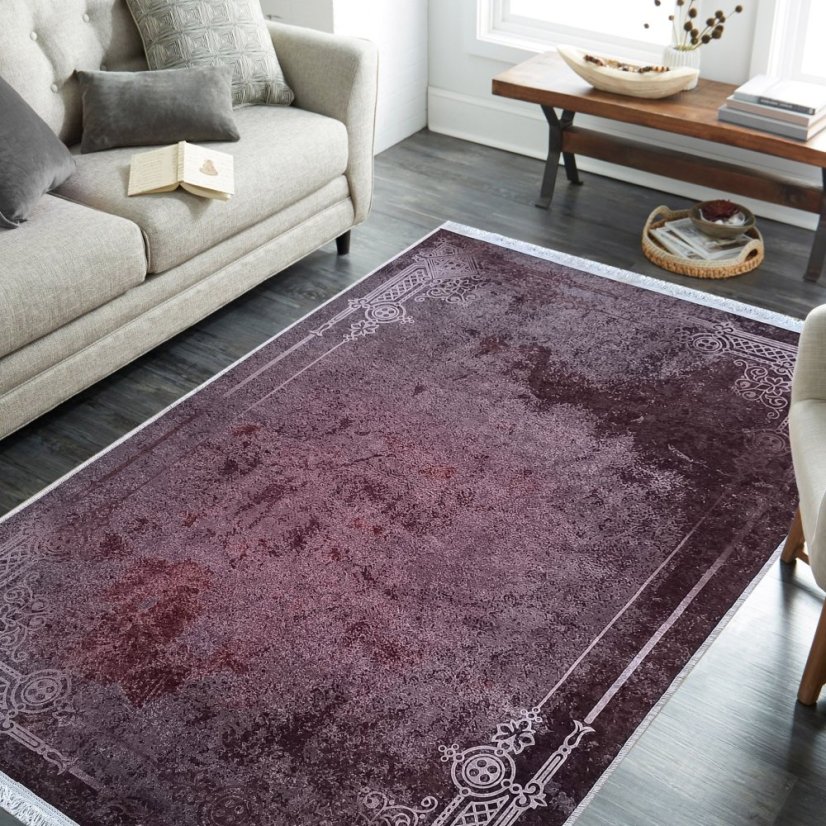 Tappeto scuro con cornice e patina orientale pregiata