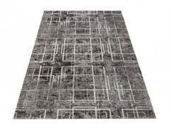 Hochwertiger grauer Teppich mit quadratischem Motiv