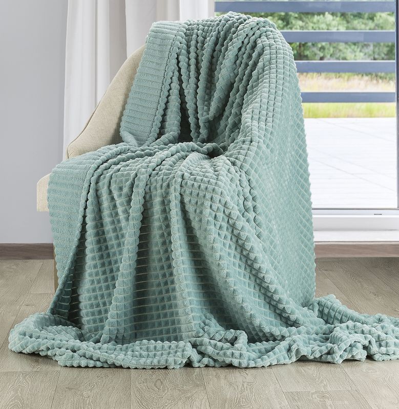 Pătură modernă, catifelată și caldă, cu un model într-o culoare frumoasă verde