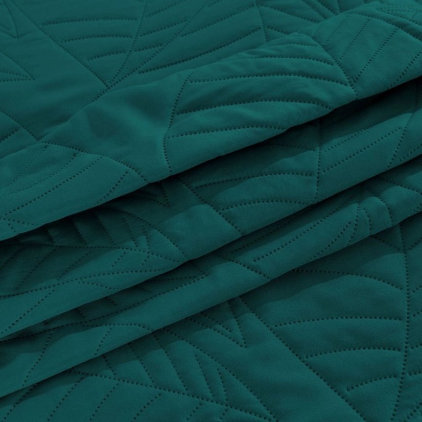 Zöld ágytakaró levél motívummal