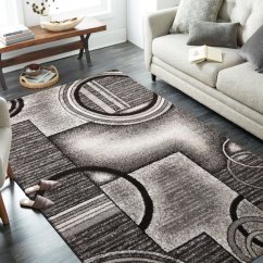 Moderni sivo-smeđi tepih s apstraktnim uzorkom krugova