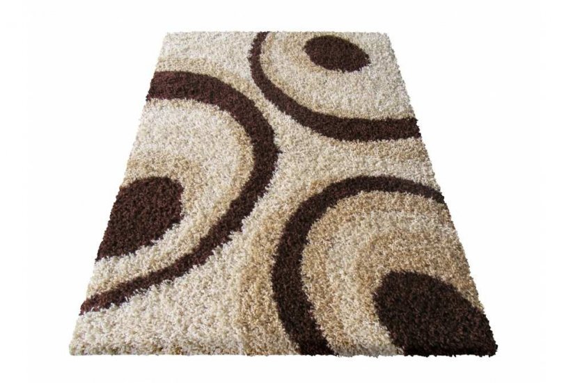 Béžový koberec s hnědými kruhy