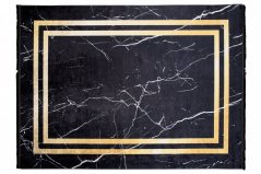 Temna oblikovalska preproga z marmornatim vzorcem z zlatimi podrobnostmi