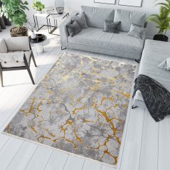 Teppich mit Goldmotiv für das Wohnzimmer