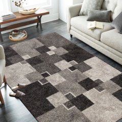 Originálny koberec s motívom štvorcov béžovej farby
