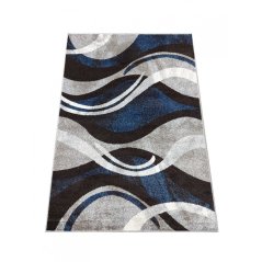 Origineller Teppich mit abstraktem Muster in blaugrauer Farbe