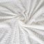 Beige, dekorative Decke aus samtweichem Stoff