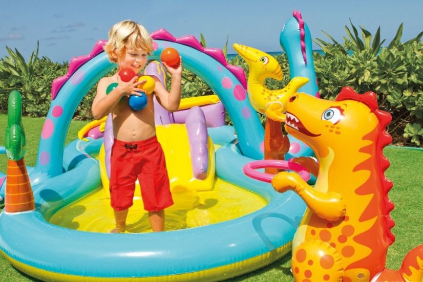 Piscina a forma di parco giochi con dinosauro