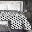 Biely obojstranný prehoz na posteľ s geometrickými vzormi