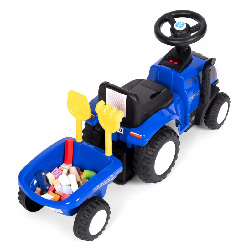 Trattore blu NEW HOLLAND con rivestimento e utensili