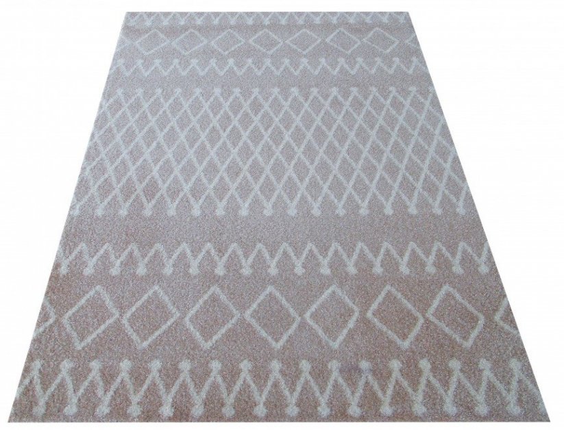 Kusový koberec béžové barvy s originálním vzorem