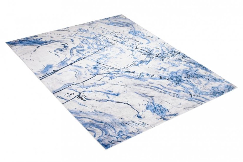 Semplice tappeto bianco e blu con motivo astratto