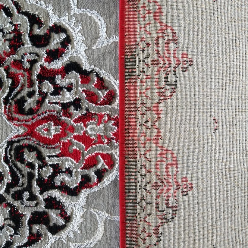 Elegantní koberec červené barvy ve vintage stylu