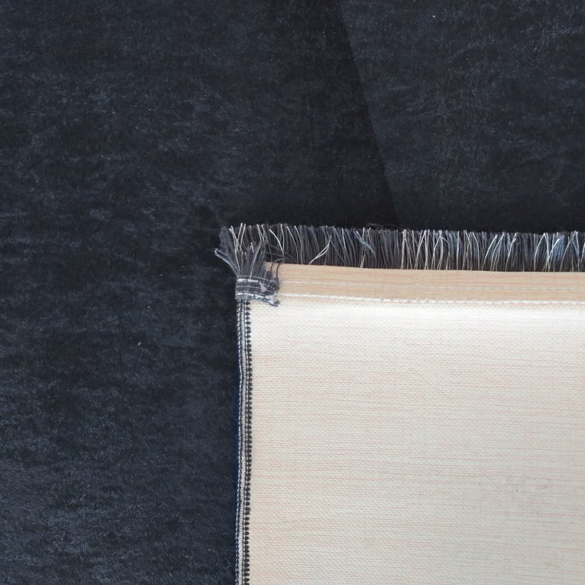 Moderner schwarzer Teppich mit abstraktem Muster