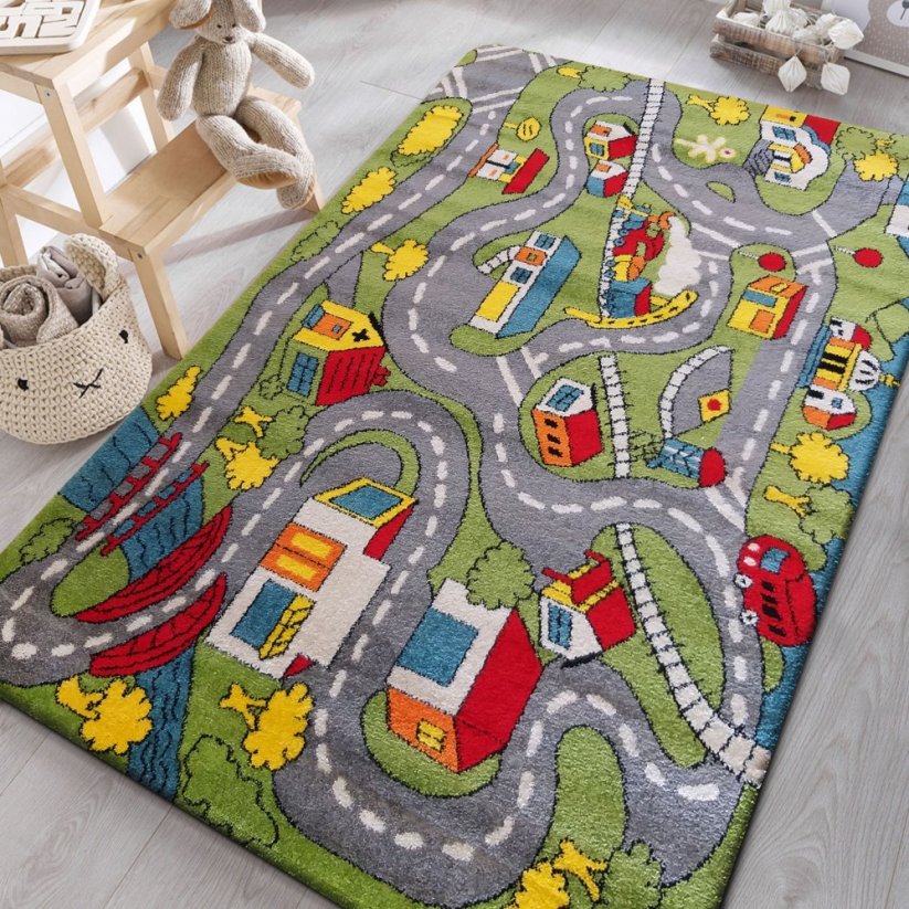 Dětský pestrobarevný koberec s motivem města