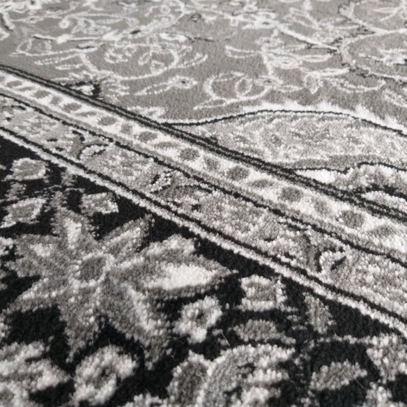 Szürke szőnyeg mandala díszekkel