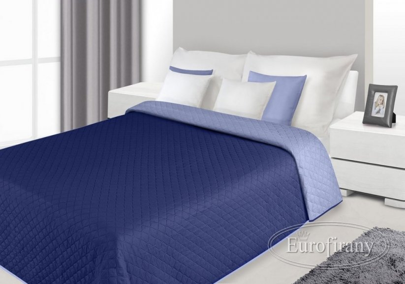 Oboustranný přehoz na postel tmavě modré barvy s prošíváním