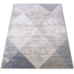 Beigefarbener Teppich mit modernem geometrischem Muster
