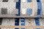 Terasový sivý koberec s modrým vzorom
