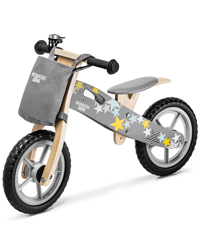 Sivý balančný bicykel s úložným vreckom