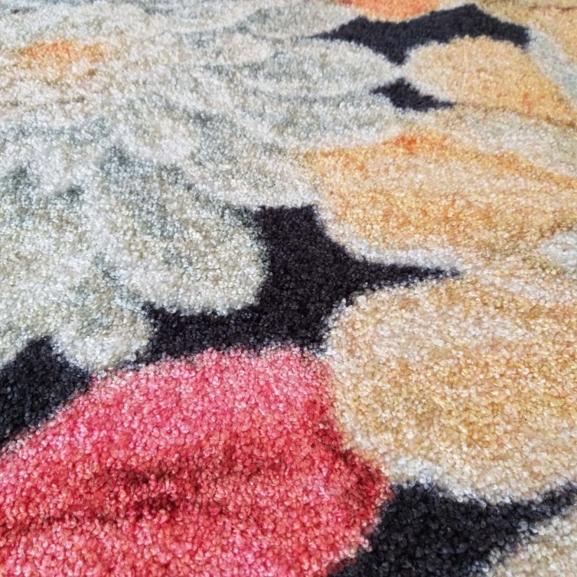 Affascinante tappeto con motivo floreale
