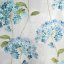 Gyönyörű szürke-kék sötétedő függöny virágmotívummal gyűrűkön lógva 140 x 250 cm