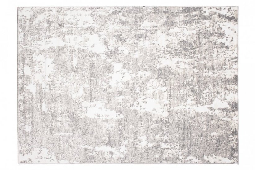 Designový koberec s abstraktním vzorem v krémové barvě