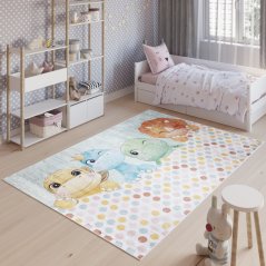 Kinderteppich mit dem Motiv von liebenswerten Dinosauriern