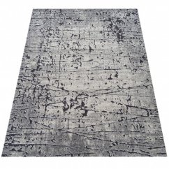Abstraktný koberec v zemitých farbách