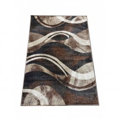 Origineller Teppich mit abstraktem Muster in brauner Farbe